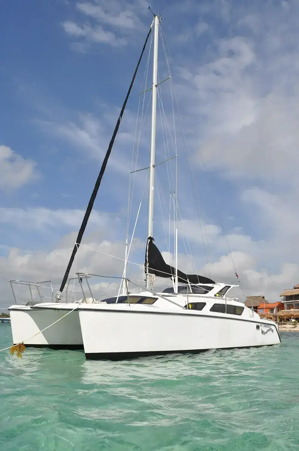 Private catamaran La Yoya anchored at Palancar Reef, Cozumel