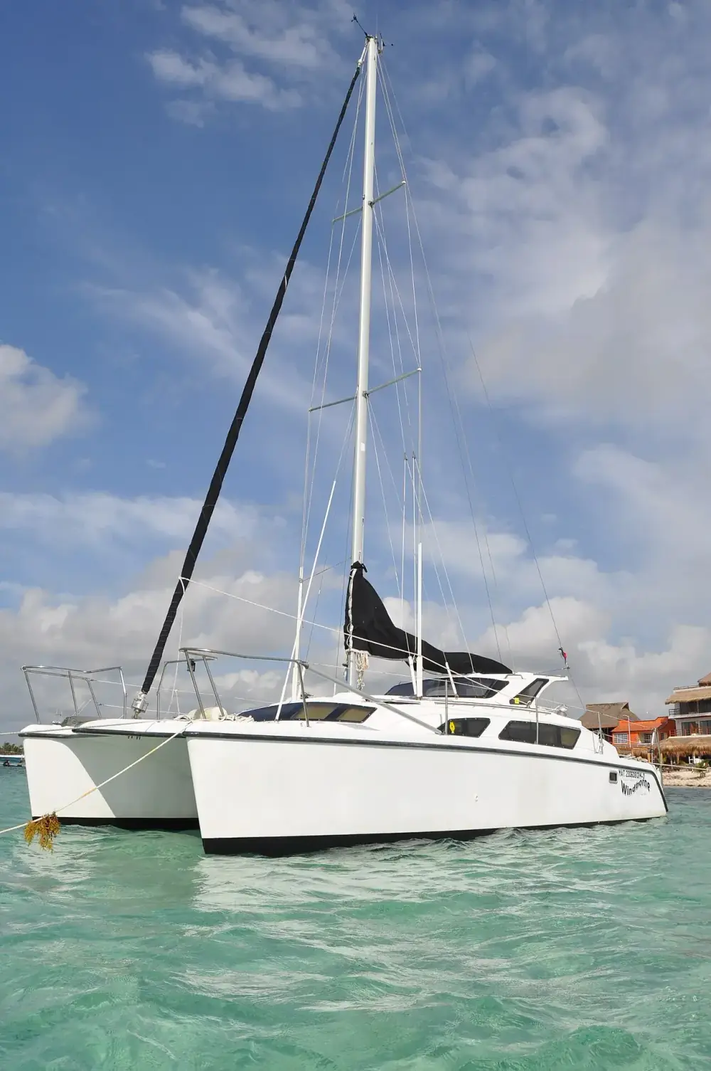 Cozumel catamaran sailing on turquoise Caribbean water near Palancar Reef Mexico