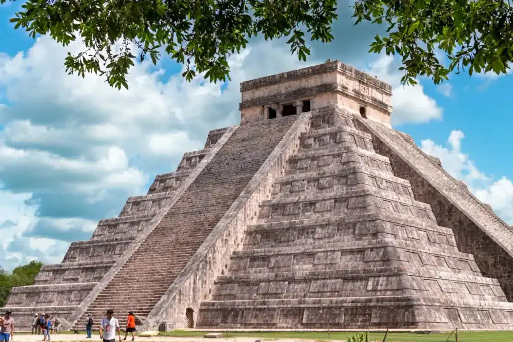 Chichen Itza Classic Day Tour from Cancun — small group with INAH-certified guide at El Castillo pyramid
